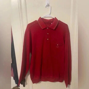 Turnbury est 1980 red long sleeve polo with design on pocket. Medium